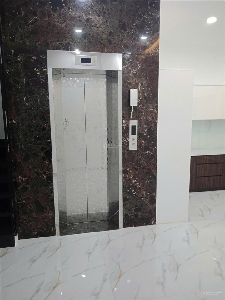 Nhà 5x20m xây 6 tầng 1 hầm 1 trệt 3 lầu st 6pn 8wc đường số tân quy