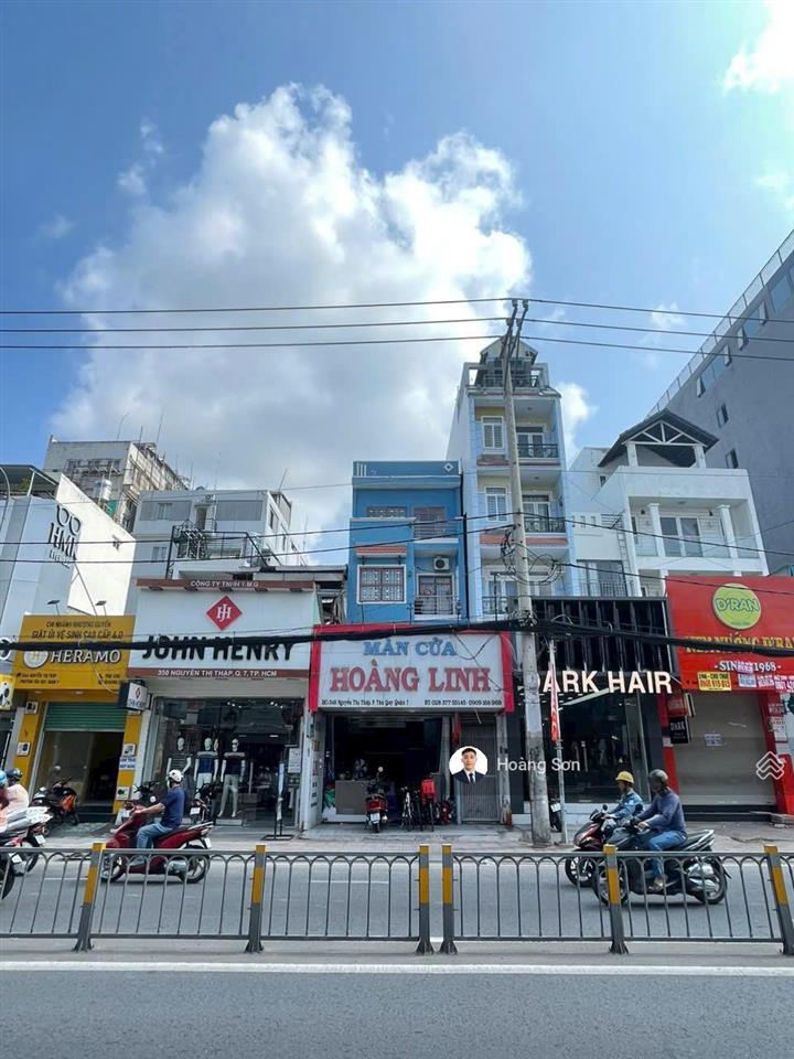 Nhà mặt tiền nguyễn thị thập (sổ hồng 5x20m) trệt + 3 lầu, giá tốt (thu nhập 60tr/tháng)