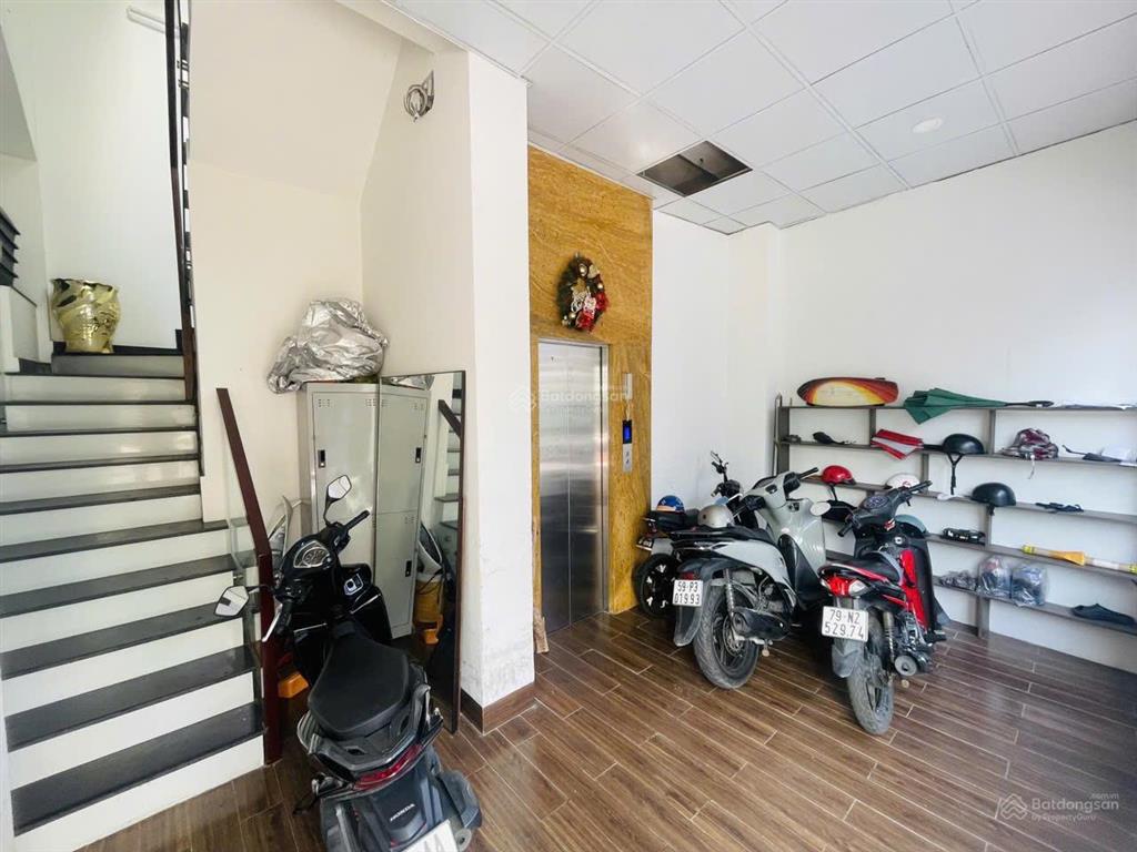 Bán nhà căn góc 6,5x16m, 4 tầng, 7 phòng, mặt tiền hồ biểu chánh, p.4, q.8