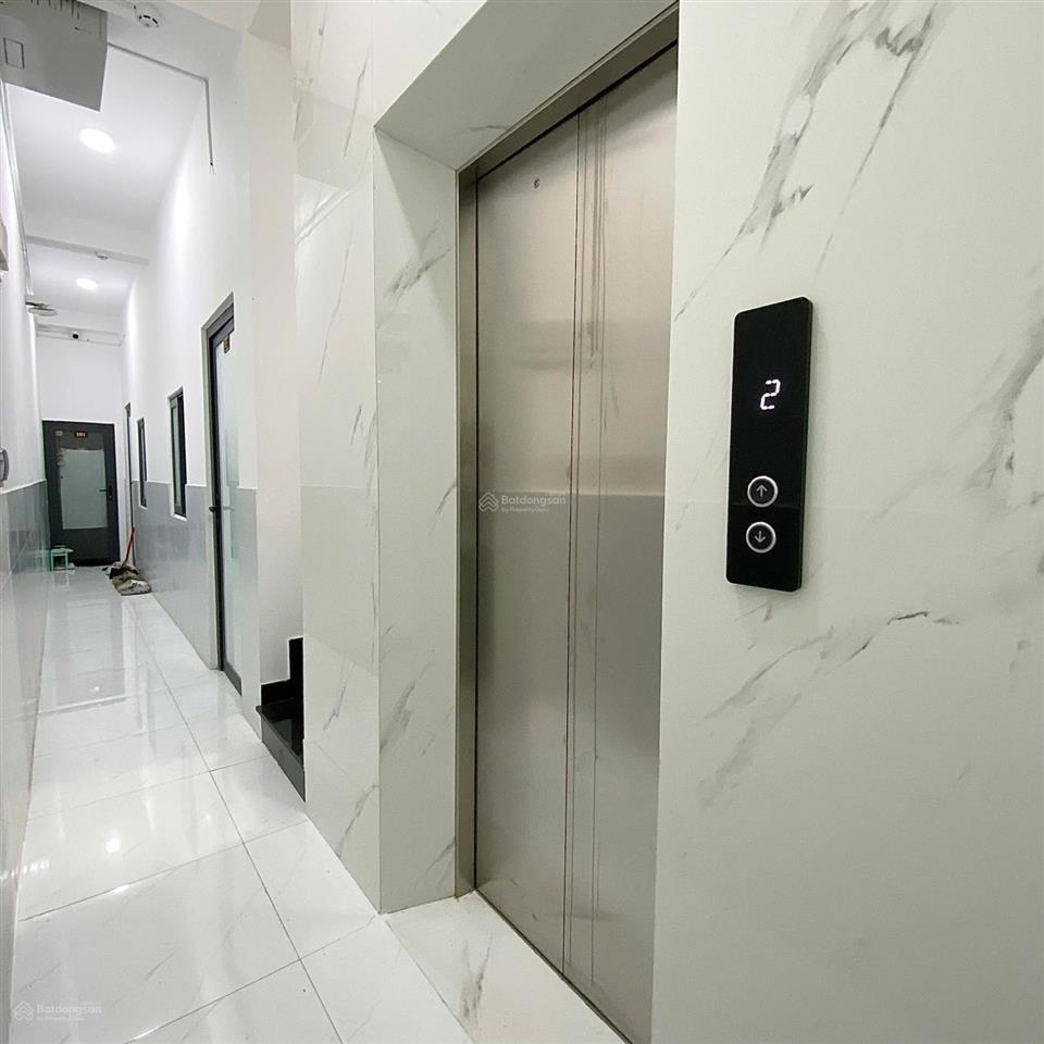 Bán nhà hẻm tôn đản quận 4, 122,1m2 3 tầng 14 phòng có thang máy thu nhập 90tr giá 13 tỷ