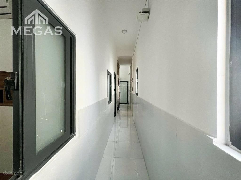 Bán nhà hẻm tôn đản quận 4, 122,1m2 3 tầng 14 phòng có thang máy thu nhập 90tr giá 13 tỷ