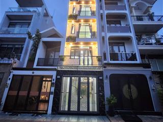 Nhà đẹp khu vực trường lưu  long trường quận 9 hcm 5 tầng, gara xe hơi nội thất cao cấp giá 6,x tỷ