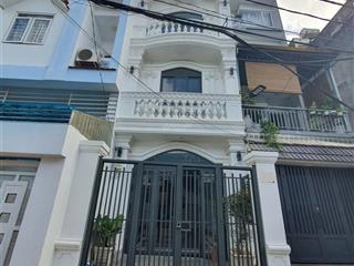 Nhà mới 4 tầng 4pn 3wc có gara, mặt tiền đường số xe hơi tránh nhau. ở và làm văn phòng đều tiện