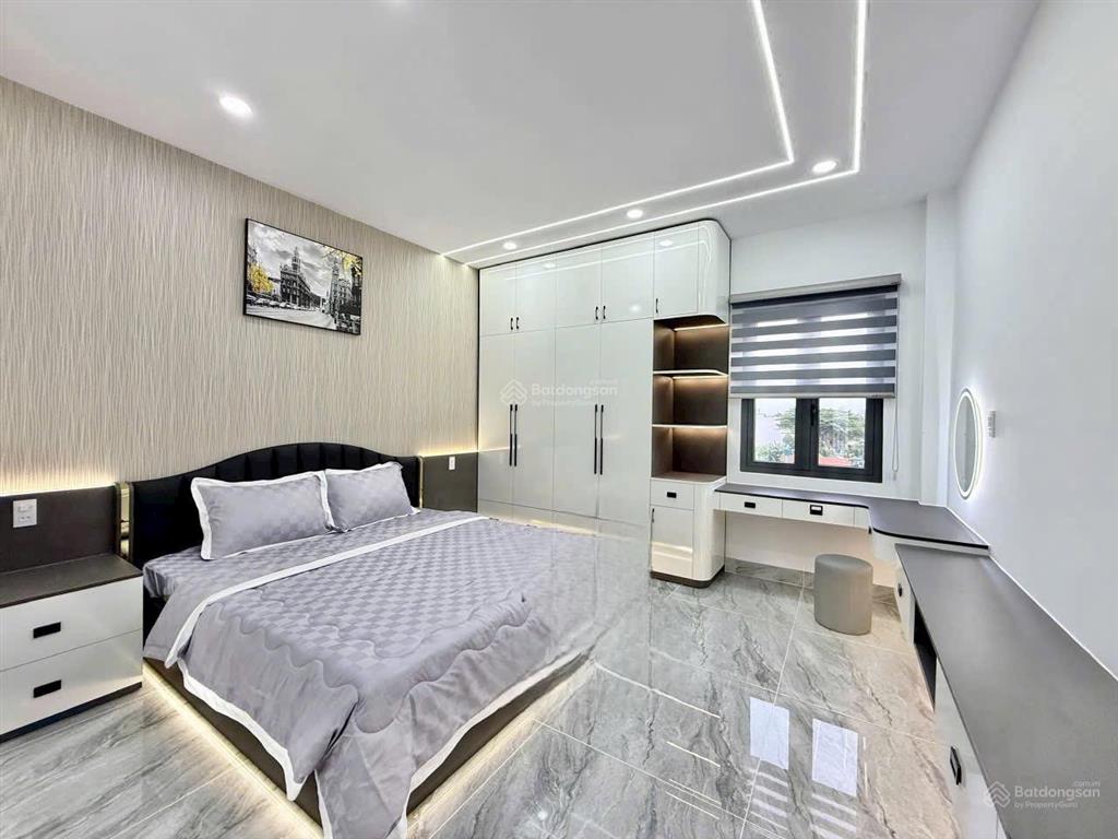 Bán 05 nhà phố 4m x 21m 4.5 tầng có thang máy, hẻm nhựa 8m thông đường lê thị riêng p.thới an