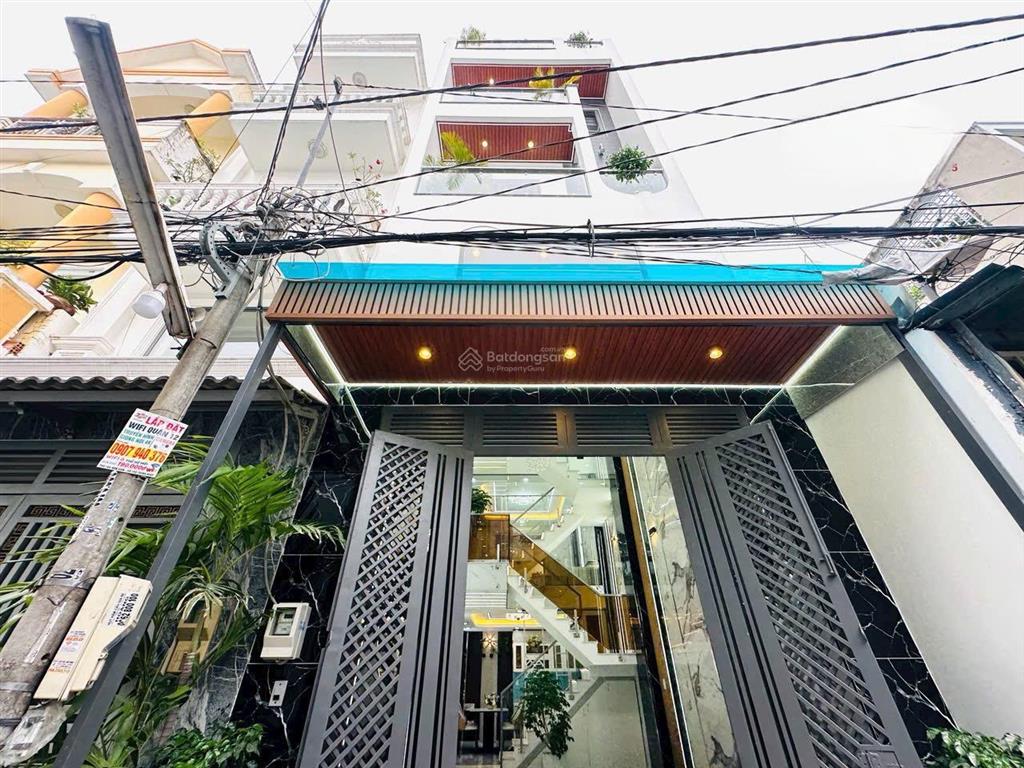 Nhà phố 4m x 14m 4,5 tầng 1/ ngắn đường lâm thị hố p. tân chánh hiệp chỉ sau nhà mặt tiền