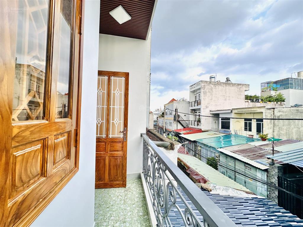 Bán nhà đẹp 4,1mx15m 2 tầng có sân rộng để xe hơi trong nhà đường nguyễn thị búp p. tân chánh hiệp
