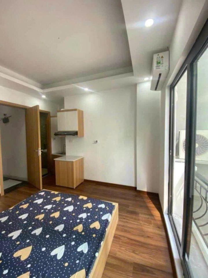 Hạ giá bán nhà Vũ Tông Phan 42m2, 6T thang máy ô tô thông dòng tiền 50tr/tháng nhỉnh 12 tỷ